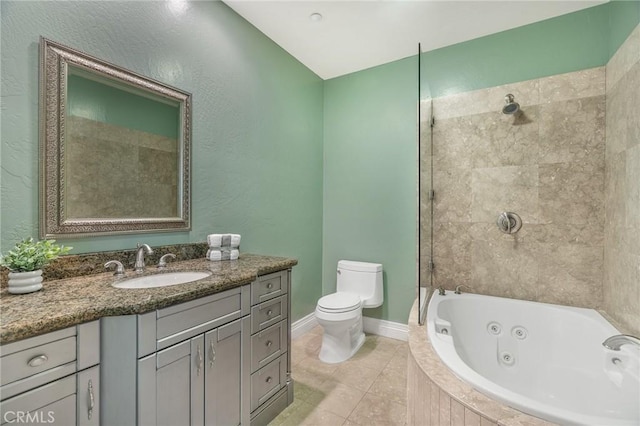 bathroom with toilet, tile patterned flooring, and vanity