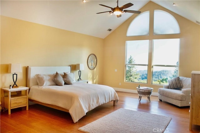 27732 N Bay Rd, Lake Arrowhead, CA 92352 - bedroom with high vaulted ceiling, wood finished floors, and a ceiling fan