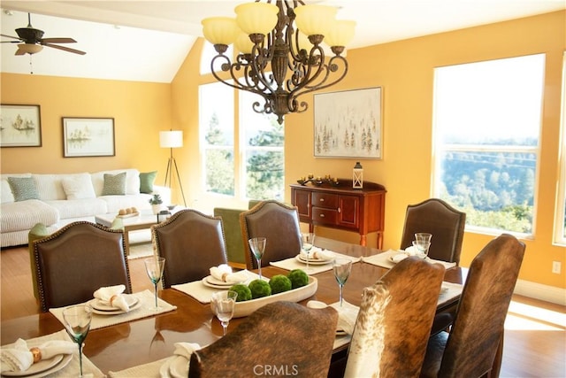 27732 N Bay Rd, Lake Arrowhead, CA 92352 - dining area with a chandelier, plenty of natural light, wood finished floors, lofted ceiling, and a ceiling fan