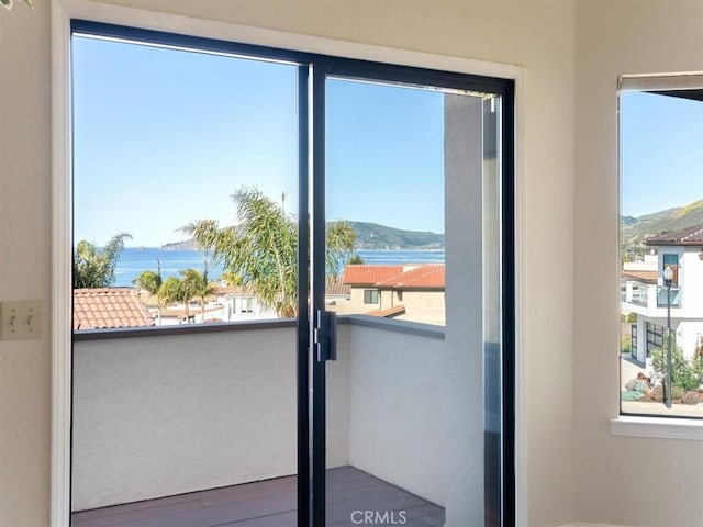 101 Searidge Ct, Pismo Beach, CA 93449 - doorway to outside featuring a water and mountain view and wood finished floors