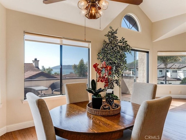 101 Searidge Ct, Pismo Beach, CA 93449 - dining space featuring ceiling fan, wood finished floors, and high vaulted ceiling