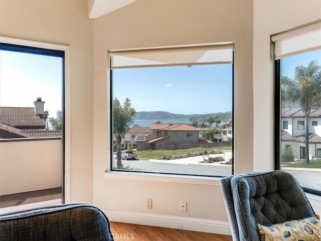 101 Searidge Ct, Pismo Beach, CA 93449 - living area with a mountain view and wood finished floors