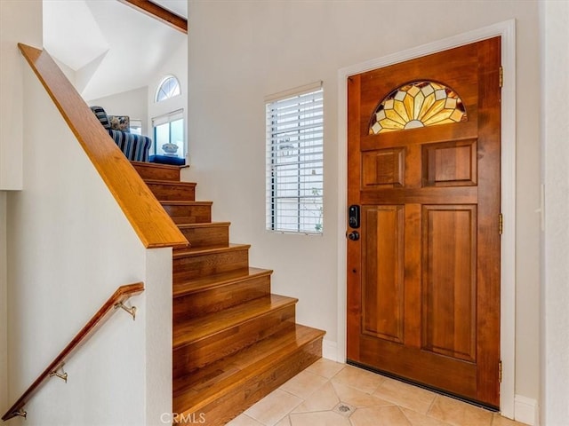 101 Searidge Ct, Pismo Beach, CA 93449 - foyer with stairway, light tile patterned floors, and vaulted ceiling