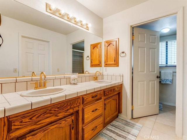 101 Searidge Ct, Pismo Beach, CA 93449 - bathroom featuring double vanity, tile patterned floors, and an enclosed shower