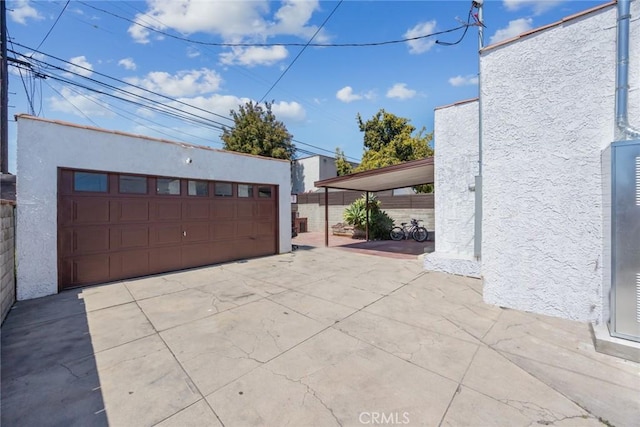 detached garage with fence