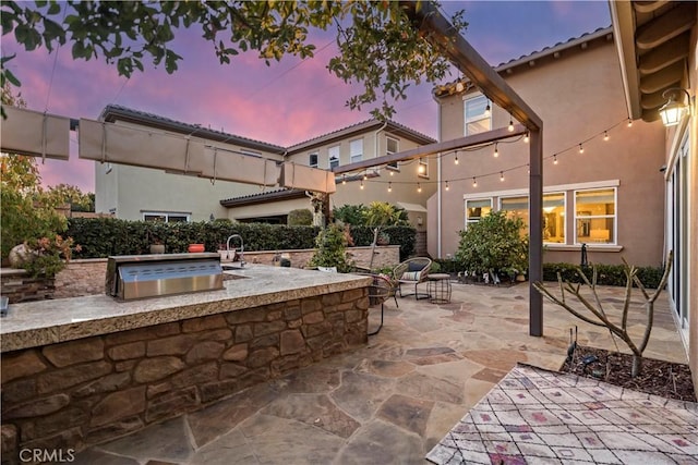 19 Dogwood, Lake Forest, CA 92630 - view of patio featuring an outdoor kitchen and a sink