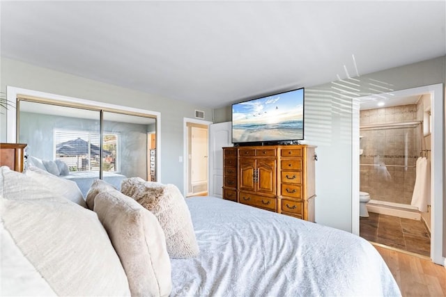 4811 Sharon Dr, La Palma, CA 90623 - bedroom with wood finished floors, a closet, and ensuite bath