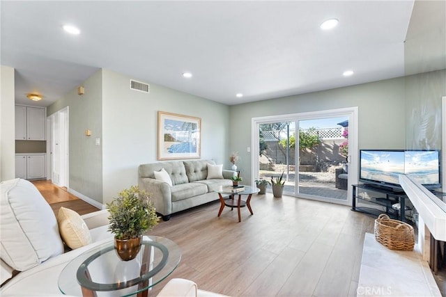 4811 Sharon Dr, La Palma, CA 90623 - living room featuring light wood-type flooring, recessed lighting, and baseboards