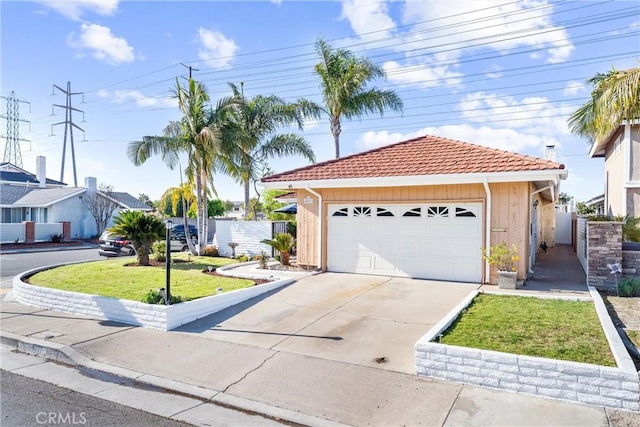 4811 Sharon Dr, La Palma, CA 90623 - single story home featuring a tile roof, driveway, and a garage