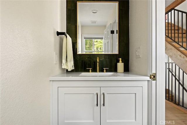 27684 St Bernard Ln, Lake Arrowhead, CA 92352 - bathroom with visible vents, wood finished floors, and vanity