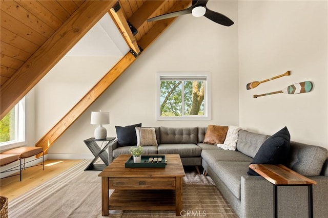 27684 St Bernard Ln, Lake Arrowhead, CA 92352 - living area with vaulted ceiling with beams, a ceiling fan, wood finished floors, and a wealth of natural light