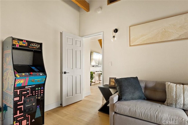 27684 St Bernard Ln, Lake Arrowhead, CA 92352 - living area with baseboards, beamed ceiling, and wood finished floors