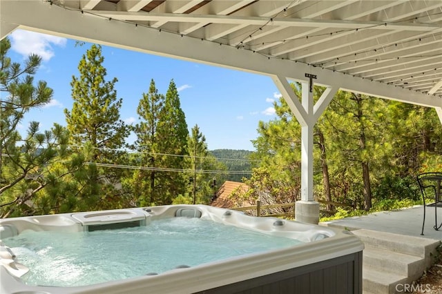 27684 St Bernard Ln, Lake Arrowhead, CA 92352 - view of patio featuring a hot tub