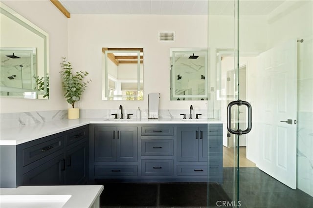 27684 St Bernard Ln, Lake Arrowhead, CA 92352 - bathroom with visible vents, a shower stall, and a sink