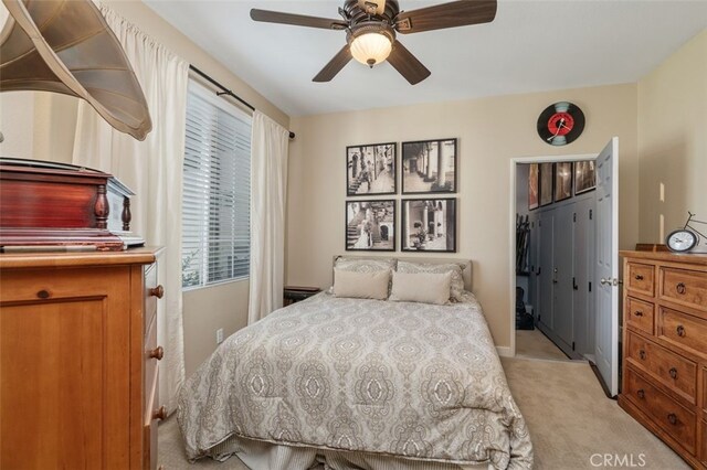 37549 Windsor Ct, Murrieta, CA 92562 - bedroom featuring light carpet and a ceiling fan