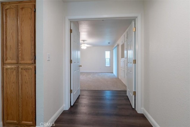 42852 Badger Circle Dr, Coarsegold, CA 93614 - hall featuring dark wood-style flooring and baseboards