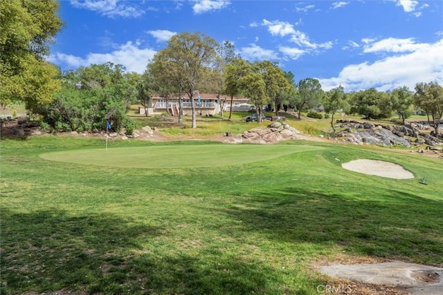 42852 Badger Circle Dr, Coarsegold, CA 93614 - view of property's community with golf course view and a lawn