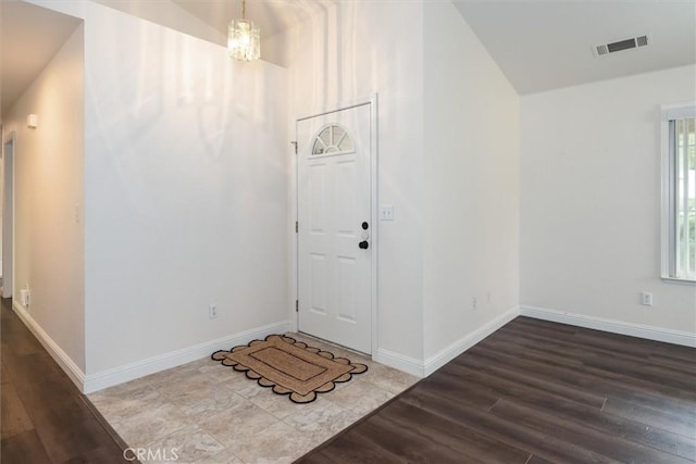 42852 Badger Circle Dr, Coarsegold, CA 93614 - entrance foyer featuring visible vents, baseboards, and wood finished floors