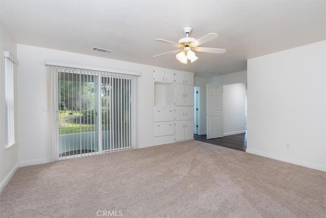 42852 Badger Circle Dr, Coarsegold, CA 93614 - unfurnished room with visible vents, ceiling fan, baseboards, and carpet
