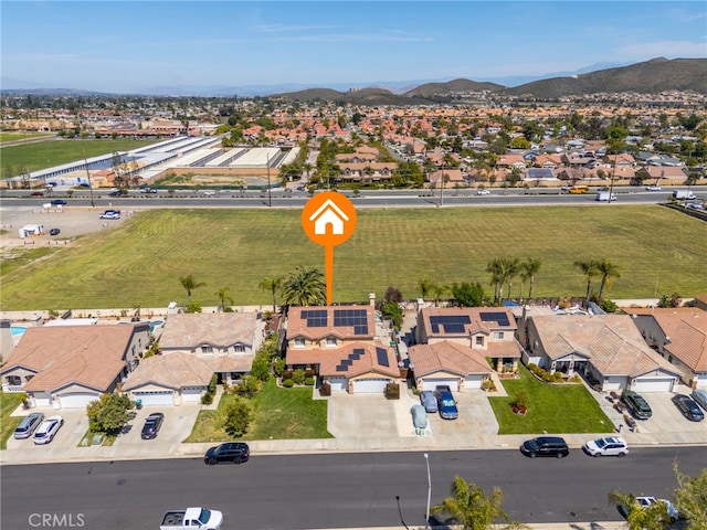 27196 Swift St, Menifee, CA 92584 - aerial overview of property's location with nearby suburban area and a mountain backdrop