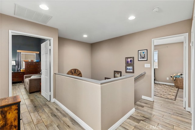 27196 Swift St, Menifee, CA 92584 - hall with an upstairs landing, light wood-style flooring, recessed lighting, and baseboards