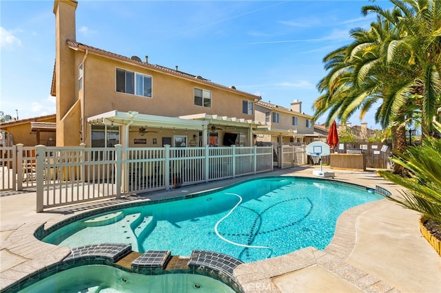 27196 Swift St, Menifee, CA 92584 - view of swimming pool featuring a pool with connected hot tub, a ceiling fan, and a patio