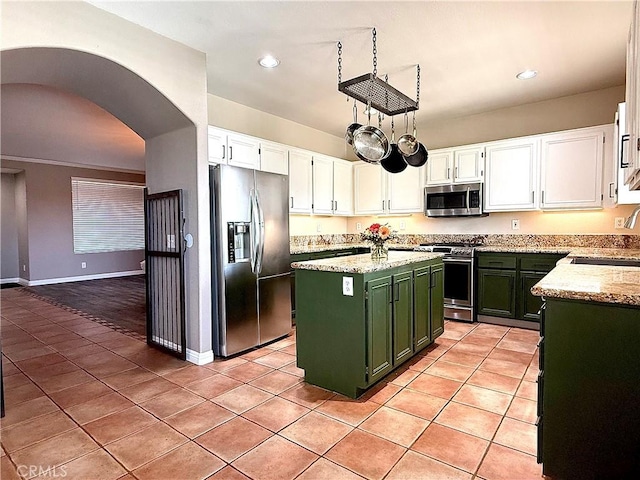 27196 Swift St, Menifee, CA 92584 - kitchen featuring green cabinets, stainless steel appliances, a sink, white cabinets, and a center island