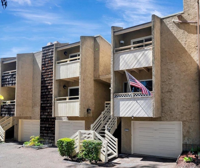 5362 Lake Murray Blvd, La Mesa, CA 91942 - view of property with an attached garage and stairs