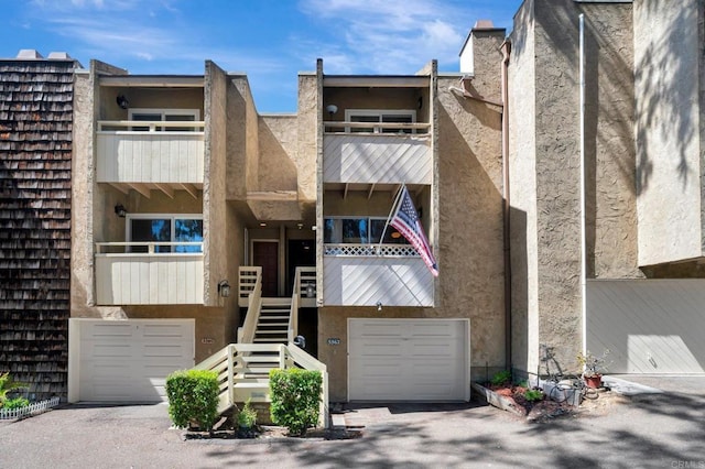 5362 Lake Murray Blvd, La Mesa, CA 91942 - view of building exterior featuring an attached garage and stairway