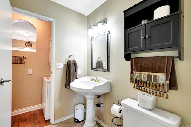 5362 Lake Murray Blvd, La Mesa, CA 91942 - bathroom featuring wood finished floors, toilet, baseboards, and washer and dryer