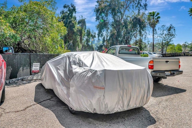 5362 Lake Murray Blvd, La Mesa, CA 91942 - view of parking / parking lot featuring fence