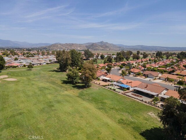 1130 Carob Ct, Hemet, CA 92545 - aerial perspective of suburban area with a mountain backdrop and a local golf course