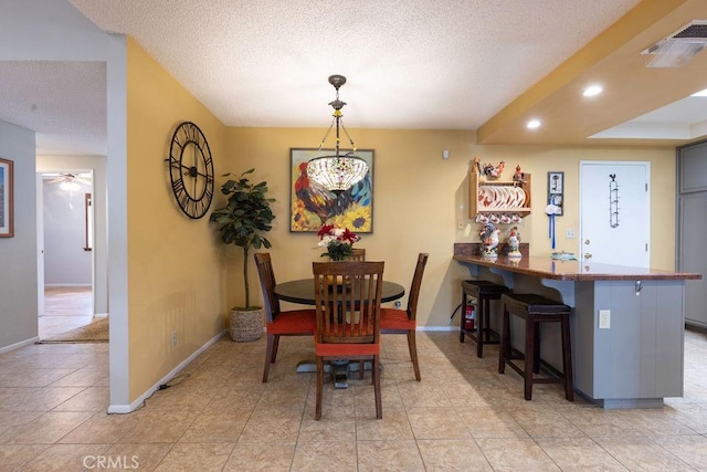 1130 Carob Ct, Hemet, CA 92545 - dining room with a textured ceiling, a ceiling fan, and recessed lighting