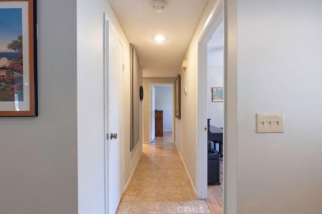 1130 Carob Ct, Hemet, CA 92545 - hall with baseboards and a textured ceiling