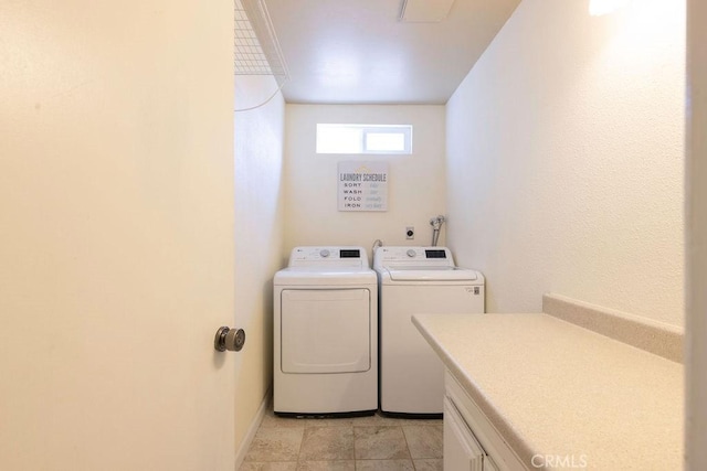 1130 Carob Ct, Hemet, CA 92545 - washroom featuring washing machine and clothes dryer and cabinet space