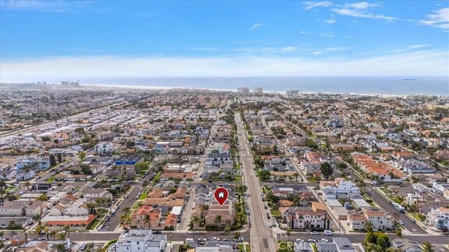 bird's eye view with a residential view and a water view