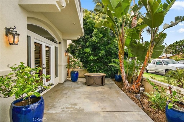 view of patio featuring french doors