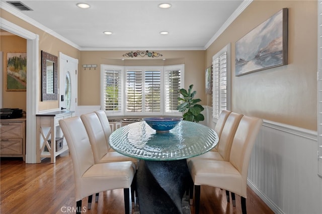 2645 S Patton Ave, San Pedro, CA 90731 - dining room with visible vents, ornamental molding, wood finished floors, and a wealth of natural light