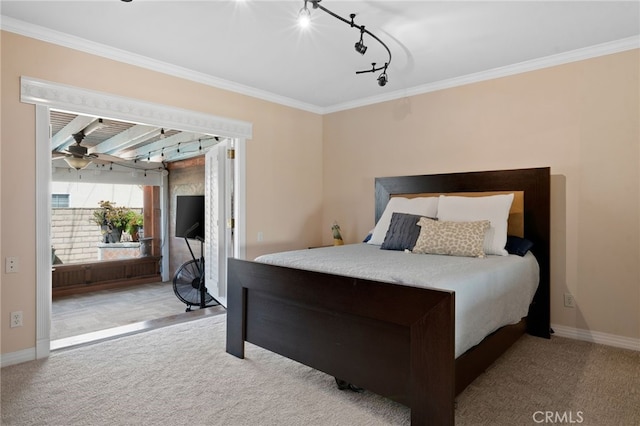 2645 S Patton Ave, San Pedro, CA 90731 - carpeted bedroom featuring crown molding, rail lighting, and baseboards