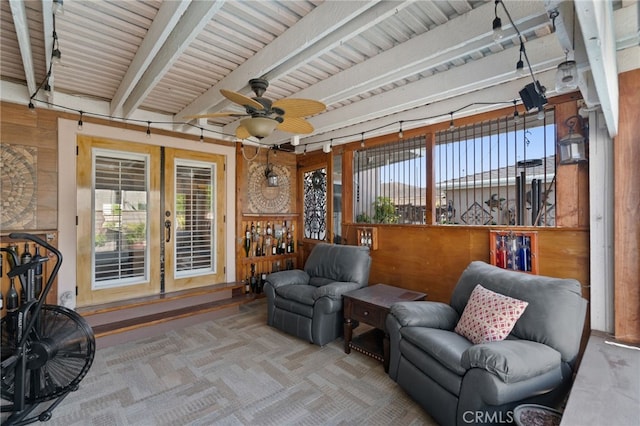 2645 S Patton Ave, San Pedro, CA 90731 - sitting room featuring wooden walls, ceiling fan, beamed ceiling, and french doors