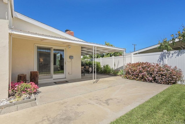 view of patio with fence