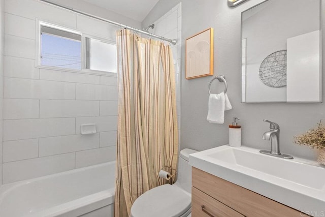 bathroom with toilet, vanity, and shower / bath combination with curtain