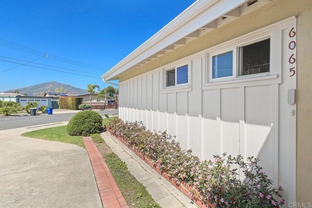 6065 Zora St, La Mesa, CA 91942 - view of home's exterior featuring board and batten siding and a mountain view
