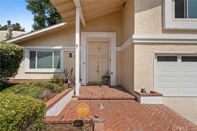 24942 Sebastian Ln, Mission Viejo, CA 92691 - view of exterior entry with an attached garage and stucco siding