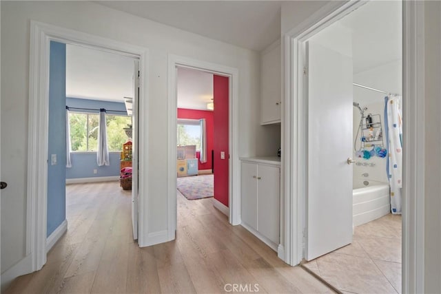 24942 Sebastian Ln, Mission Viejo, CA 92691 - hallway featuring baseboards and light wood-style floors
