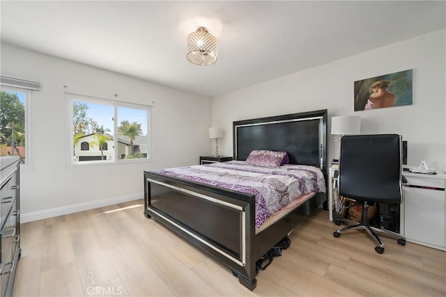 24942 Sebastian Ln, Mission Viejo, CA 92691 - bedroom featuring baseboards and light wood-type flooring