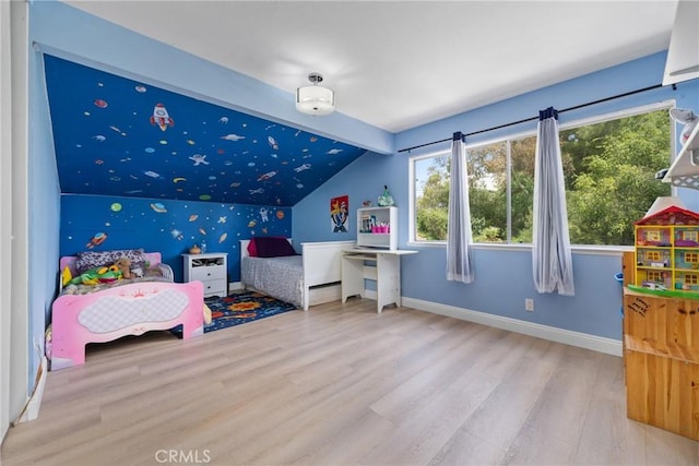 24942 Sebastian Ln, Mission Viejo, CA 92691 - bedroom with multiple windows, baseboards, wood finished floors, and lofted ceiling