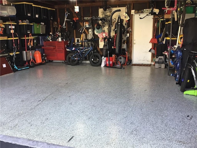 garage with a workshop area
