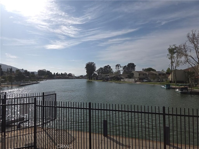 water view featuring fence