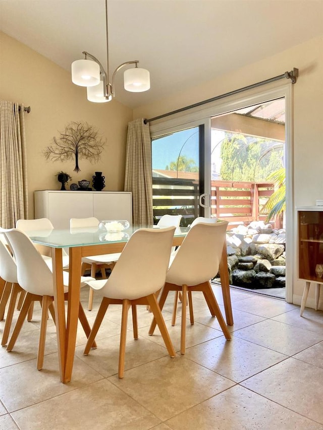 dining space with a notable chandelier